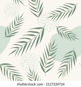 Vector seamless pattern with palm leaves. Abstract floral summer green background for print design, wallpaper, wrapping paper