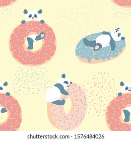 Vector seamless pattern with pandas and donuts. Good for surface design.