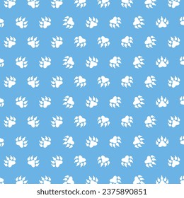 Vector seamless pattern with paw print on blue background. animal print vector illustration