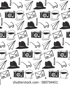 Vector Seamless pattern Photo Cameras and photographic symbols, cup coffee, mail, pencil, origami, sunglasses, hat. Seamless background sketch. The image is made in the style of hand-made. 