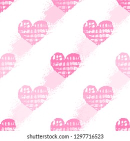 Vector seamless pattern with pink checkered hearts with diagonal brush strokes isolated on the white background.