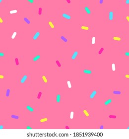 Vector seamless pattern of pink donut glaze with colorful decorative sprinkles Bright icing on pink background Flat design