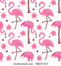 Vector seamless pattern with pink flamingos and tropical palm leaves. Exotic Hawaii art background is tropical trendy. Design for fabric, textile, wrapping paper and other decoration.