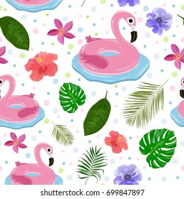 Vector seamless pattern with pink inflatable flamingos and exotic leaves and flowers