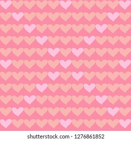 vector seamless pattern with pink and orange hearts on a pink background for decoration