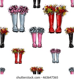 Vector seamless pattern with pink rubber flowers boots, blue rubber flowers boots, red hunter boots and leaves, rubber boots and leaves bouquet. Background for decoration seasonal celebration