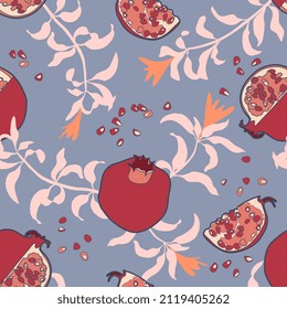 Vector seamless pattern with pomegranate fruits and seeds. For textile or wrapping paper.