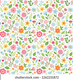 Vector seamless pattern. Pretty pattern in small multicolored flower. Small flowers. White background. Ditsy floral background. The elegant the template for fashion prints.