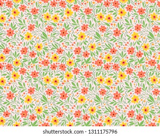 Vector seamless pattern. Pretty pattern in small flower. Small yellow and orange flowers. White background. Ditsy floral background. The elegant the template for fashion prints.