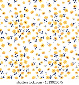 Vector seamless pattern. Pretty pattern in small flower. Small yellow flowers. White background. Ditsy floral background. The elegant the template for fashion prints.