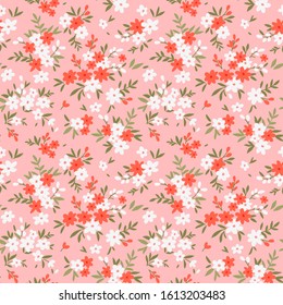 Vector seamless pattern. Pretty pattern in small flower. Small white and red flowers. Pale pink background. Ditsy floral background. The elegant the template for fashion prints.