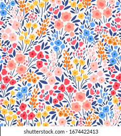 Vector seamless pattern. Pretty pattern in small flowers. Small colorful flowers. White background. Ditsy floral background. The elegant the template for fashion prints.