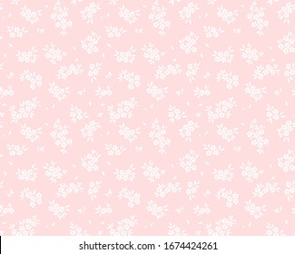 Vector seamless pattern. Pretty pattern in small flowers. Small white flowers. Light pink background. Ditsy floral background. The elegant the template for fashion prints.