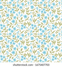 Vector seamless pattern. Pretty pattern in small flower. Small light blue flowers. White background. Ditsy floral background. The elegant the template for fashion prints.