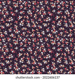 Vector seamless pattern. Pretty pattern in small flowers. Small colorful flowers. Dark violet  background. Ditsy floral background. The elegant the template for fashion prints. Stock vector.