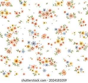 Vector seamless pattern. Pretty pattern in small flowers. Small yellow and orange flowers. White background. Ditsy floral background. The elegant the template for fashion prints. Stock vector.