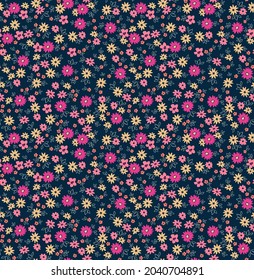 Vector seamless pattern. Pretty pattern in small flowers. Small yellow, coral and fuchsia flowers. Blue background. Ditsy floral background. The elegant the template for fashion prints. Stock vector.
