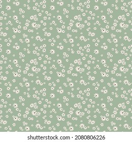 Vector seamless pattern. Pretty pattern in small flowers. Small white flowers. Blue green background. Ditsy floral background. The elegant the template for fashion prints. Stock vector.