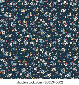 Vector seamless pattern. Pretty pattern in small flowers. Small colorful flowers. Blue background. Ditsy floral background. The elegant the template for fashion prints. Stock vector.