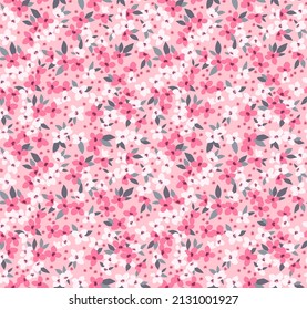 Vector seamless pattern. Pretty pattern in small flowers. Small pink and white flowers. Light pink background. Ditsy floral background. The elegant the template for fashion prints. Stock vector.