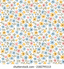 Vector seamless pattern. Pretty pattern in small flowers. Small colorful flowers. White background. Ditsy floral background. The vintage template for fashion prints. Stock vector.