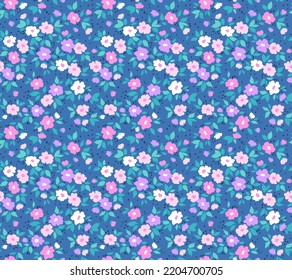 Vector seamless pattern. Pretty pattern in small flowers. Small colorful pastel flowers. Pale blue background. Ditsy floral background. The elegant the template for fashion prints. Stock vector.