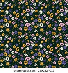 Vector seamless pattern. Pretty pattern in small flowers. Small multicolored flowers. Black background. Ditsy floral background. Elegant template for fashion prints. Stock vector.