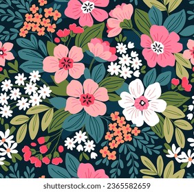 Vector seamless pattern. Pretty pattern in vintage flowers. Small colorful flowers. Dark blue background. Liberty floral background. Beautiful template for fashion prints. Stock vector.