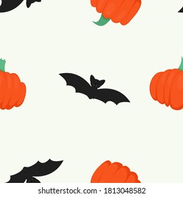 Vector seamless pattern with pumpkins and bats on white background. For halloween decoration and invitations, fabric, kitchen textile and print, web page background, gift and wrapping paper.