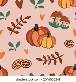 Vector seamless pattern with pumpkins, citruses, mushroom, little hearts and autumn leaves. Thanksgiving theme