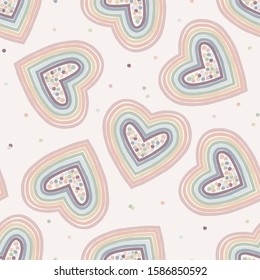 Vector seamless pattern with rainbow heart and polka dots. Creative scandinavian childish background for Valentine's Day. Cute colourful hearty backdrop for wrapping paper, textile, fabric, card