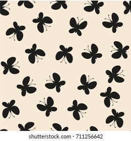 Vector seamless pattern. Randomly disposed butterflies. Cute background for print on fabric, paper, scrapbooking. Modern graphic design. Hipster creative tileable print