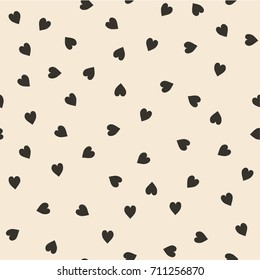 Vector seamless pattern. Randomly disposed hearts. Cute background for print on fabric, paper, scrapbooking. Modern graphic design. Hipster creative tileable print  