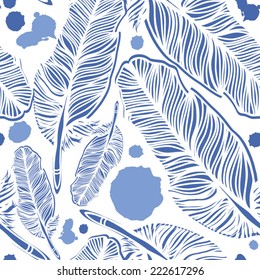 Vector seamless pattern with raven's and peacock's feathers.