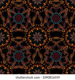 Vector seamless pattern in red, blue and orange colors on black background. Snowflakes winter New Year frame.
