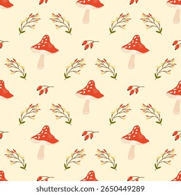 Vector Seamless pattern with red mushrooms, rosehips, and forest leaves in warm autumn tones. Perfect for fall-themed fabric home decor, textiles, and wallpape.