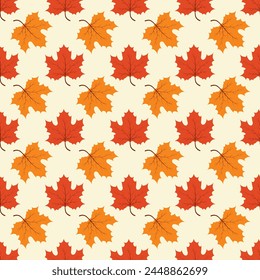 Vector seamless pattern with red and orange maple leaves. Vector illustration.