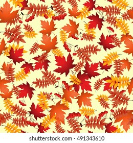 Vector seamless pattern with red and yellow autumn leaves