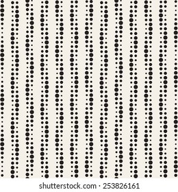 Vector seamless pattern. Regular simple texture. Dotted monochrome stripes