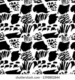 Vector seamless pattern. Repeatable texture with black ink drawn strokes various shapes. Artistic monochrome background. Black and white baackdrop.