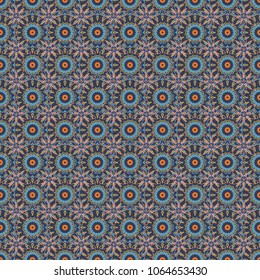 Vector seamless pattern, repeating abstract figures. Illustration in violet, blue and orange colors. Graphic modern seamless pattern for fabric, event, wallpaper etc.