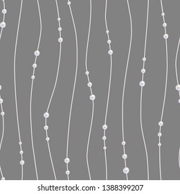 Vector seamless pattern. Repeating Pearl necklace. Chains of white pearls forming an ornament. Realistic strands of white pearls, decorative element for cards, wedding invitations. Threads of pearls