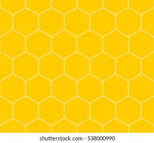 Vector seamless pattern. The pattern resembles a honeycomb and snakeskin. Yellow background.