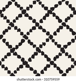 Vector seamless pattern with rhombuses. Abstract background made using of brush smears. Monochrome hand drawn texture. Trendy hipster print. Modern graphic design.