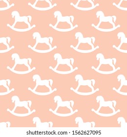 Vector seamless pattern with rocking horses. Children's illustration. Toy horse.