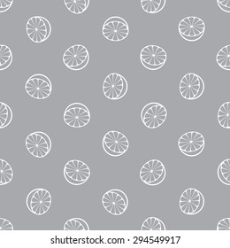 Vector seamless pattern with rotated half citrus fruits, can be interpreted as lemons, grapefruits, oranges etc.