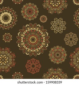 Vector seamless pattern with round floral ornaments