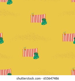 Vector seamless pattern with a sandy beach, beach mats and beach umbrellas