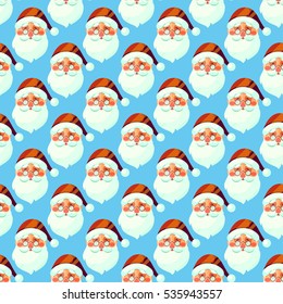 Vector seamless pattern with Santa Claus head. Winter holiday pattern for paper, fabric, greeting card.