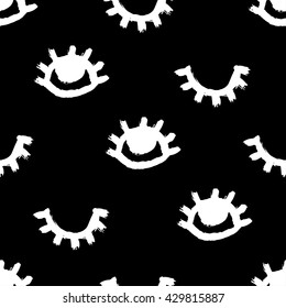 Vector seamless pattern in the scandinavian style. Hand drawn tribal print of open and close eyes. Stylish background for web page, fabric design, scrapbook elements, wrapping paper, cards, cover